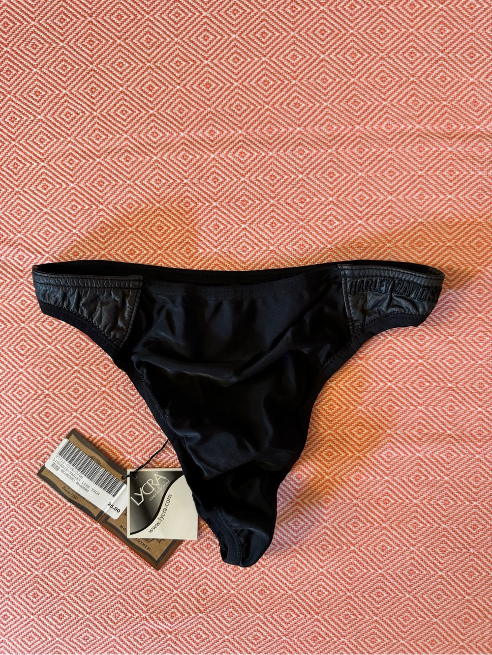 Medium Harley black thong panty, Lycra and leather. NWT.
